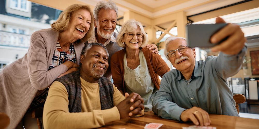 Seniors sharing a video call with family
